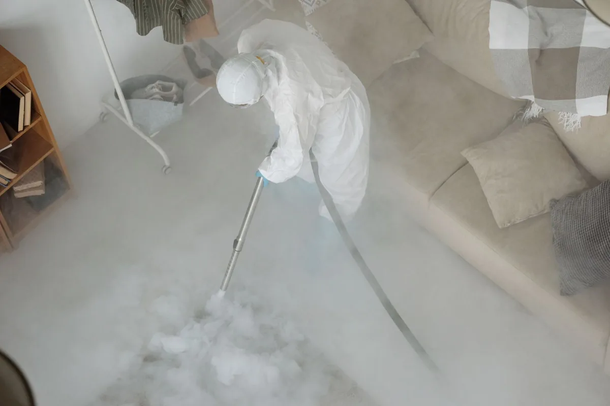 Biohazard cleanup technician in protective equipment, Cascade Locks, OR